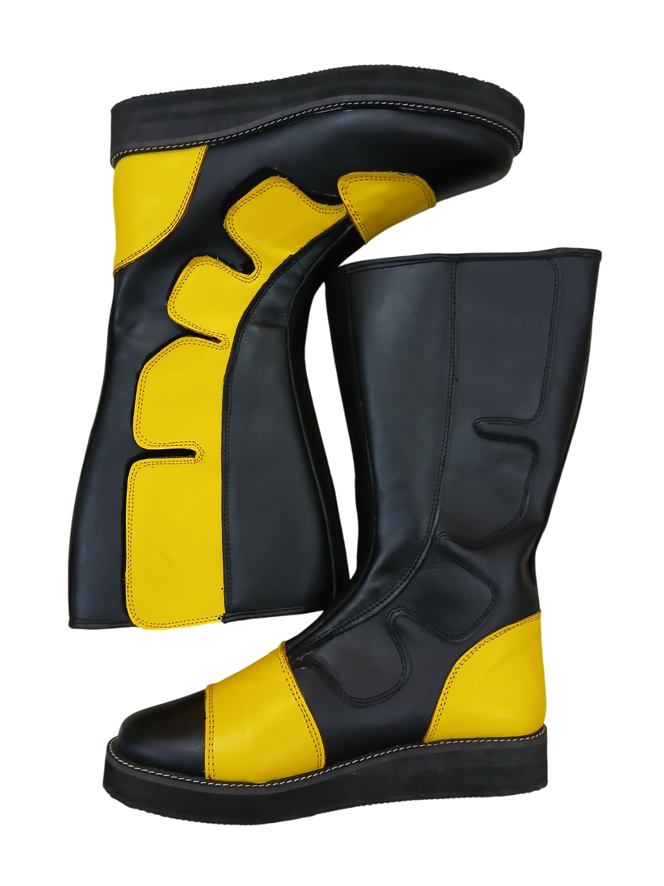 Black and yellow knee-high boots on a white background