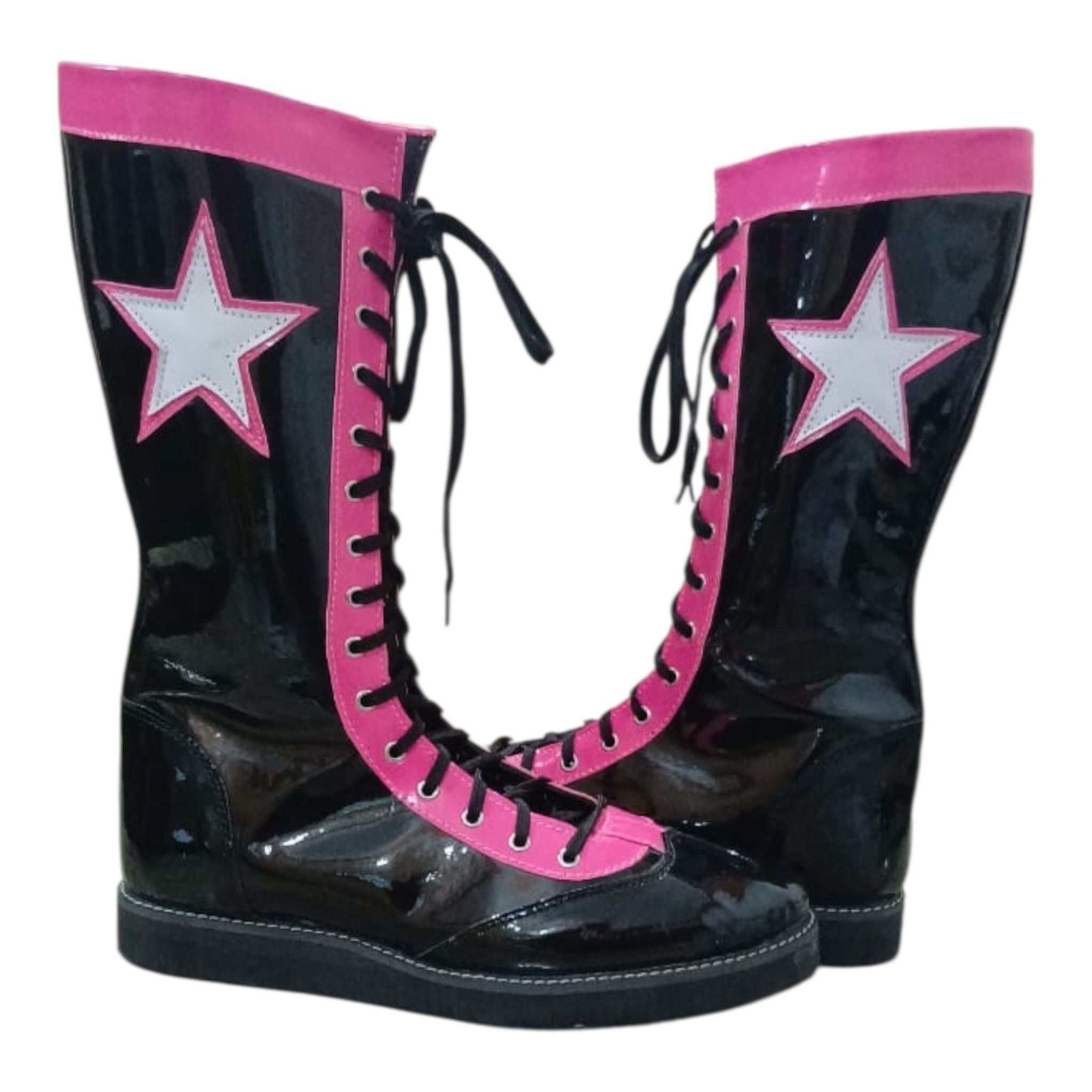 Black and pink knee-high wrestling boots with star design and lace-up front