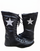 Black leather knee-high wrestling boots with white star appliqué patch on outer shaft and full black lace-up closure on white background