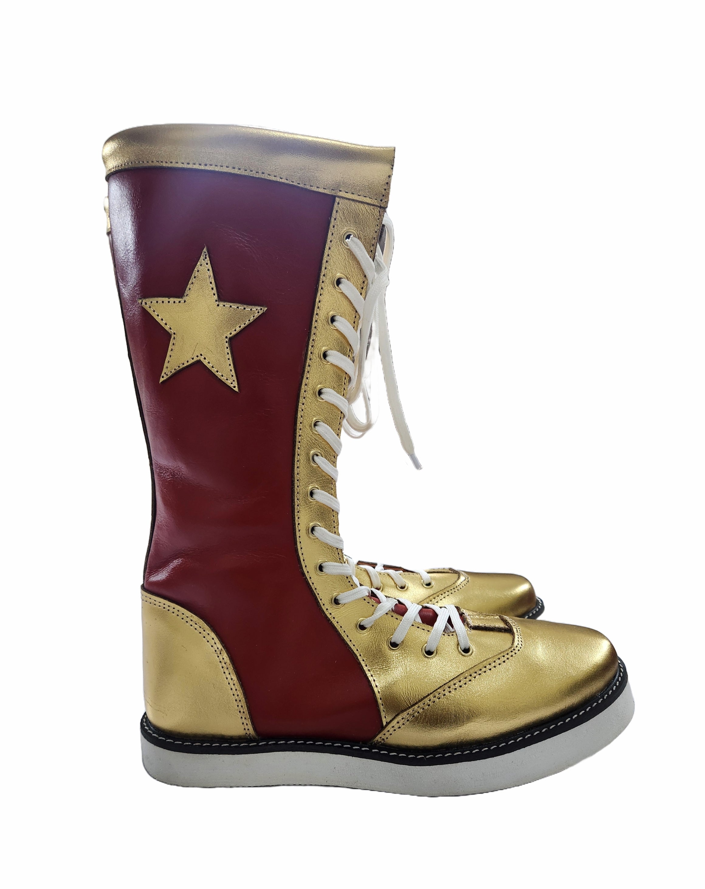 Close-up of gold metallic star appliqué patch precision-stitched onto red leather wrestling boot outer shaft
