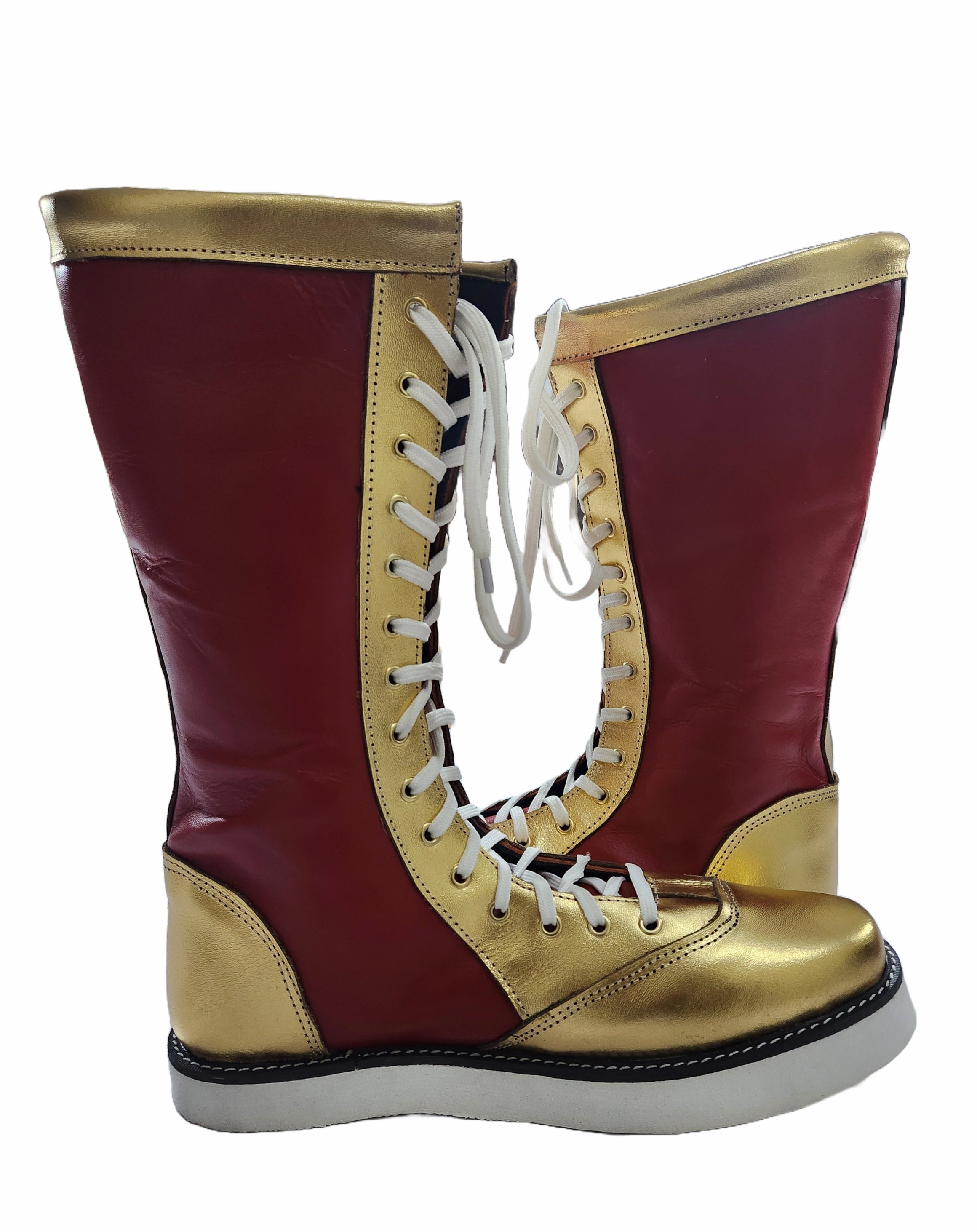 Maroon and gold boots with white laces on a white background