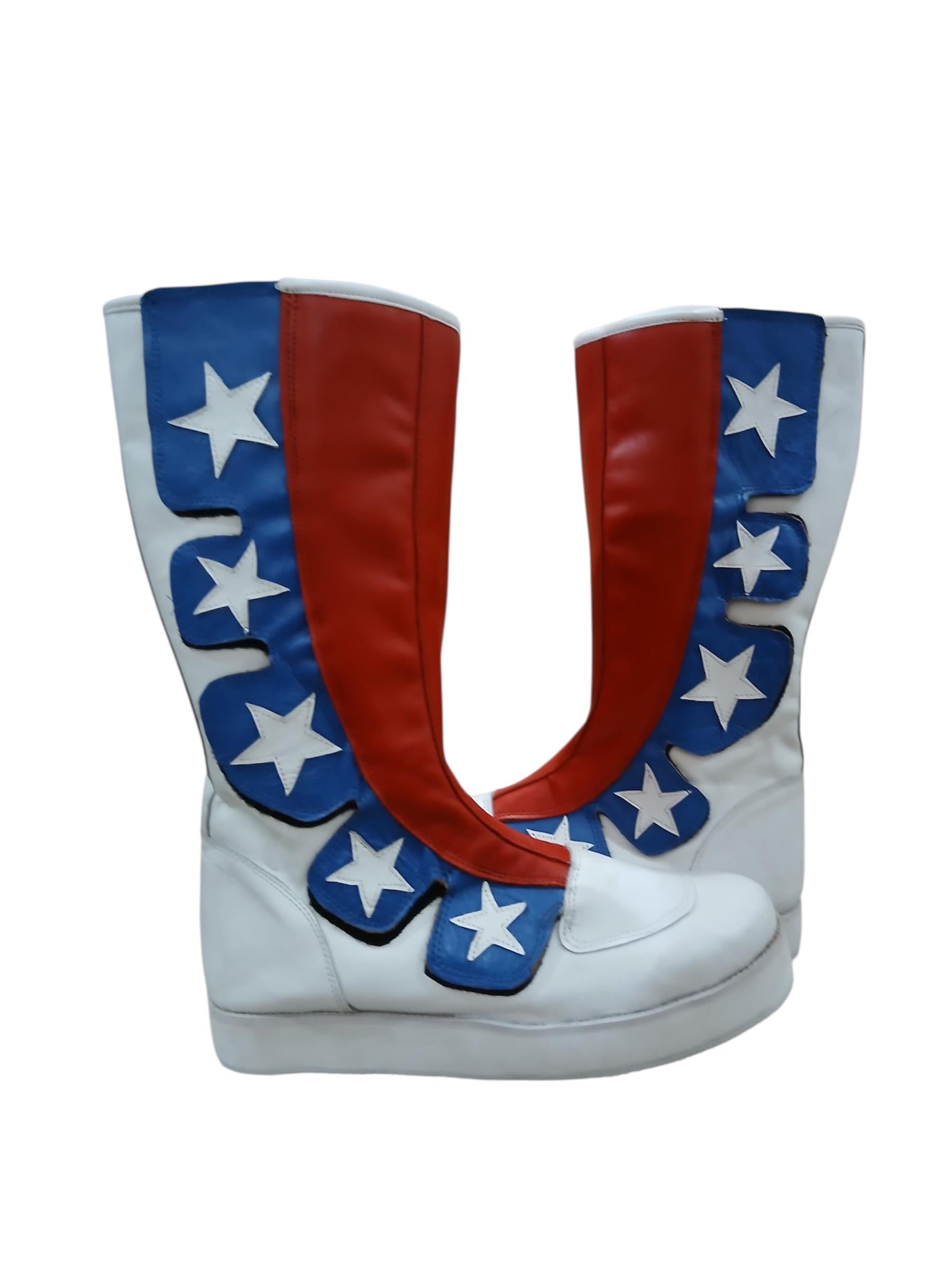 Pair of boots with American flag design on a white background
