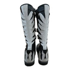 Top-down view of black Top-down view of black and white wrestling boots