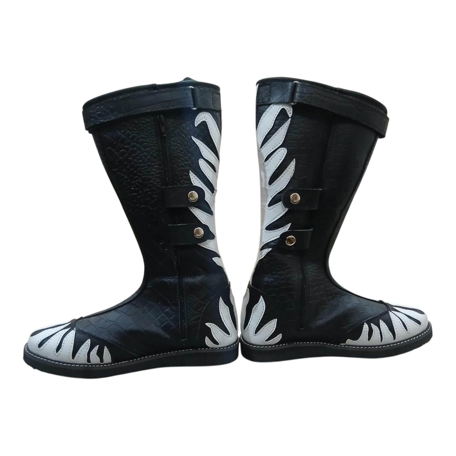 Black boots with white feather-like patterns on a white background
