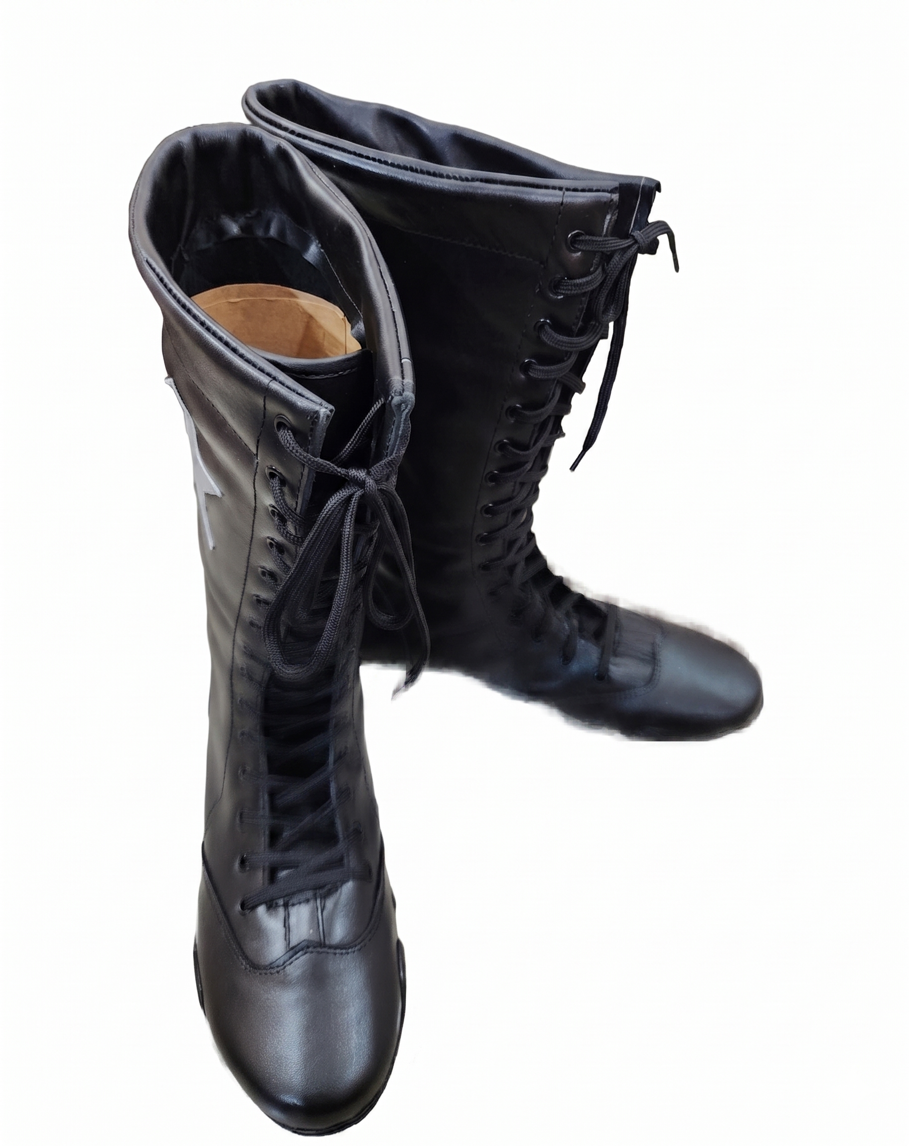 Top-down angle of black knee-high wrestling boots displaying padded collar construction and seamless all-black leather finish