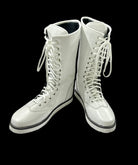 Close-up of white leather boot shaft showing silver metal eyelets and lace-up closure
