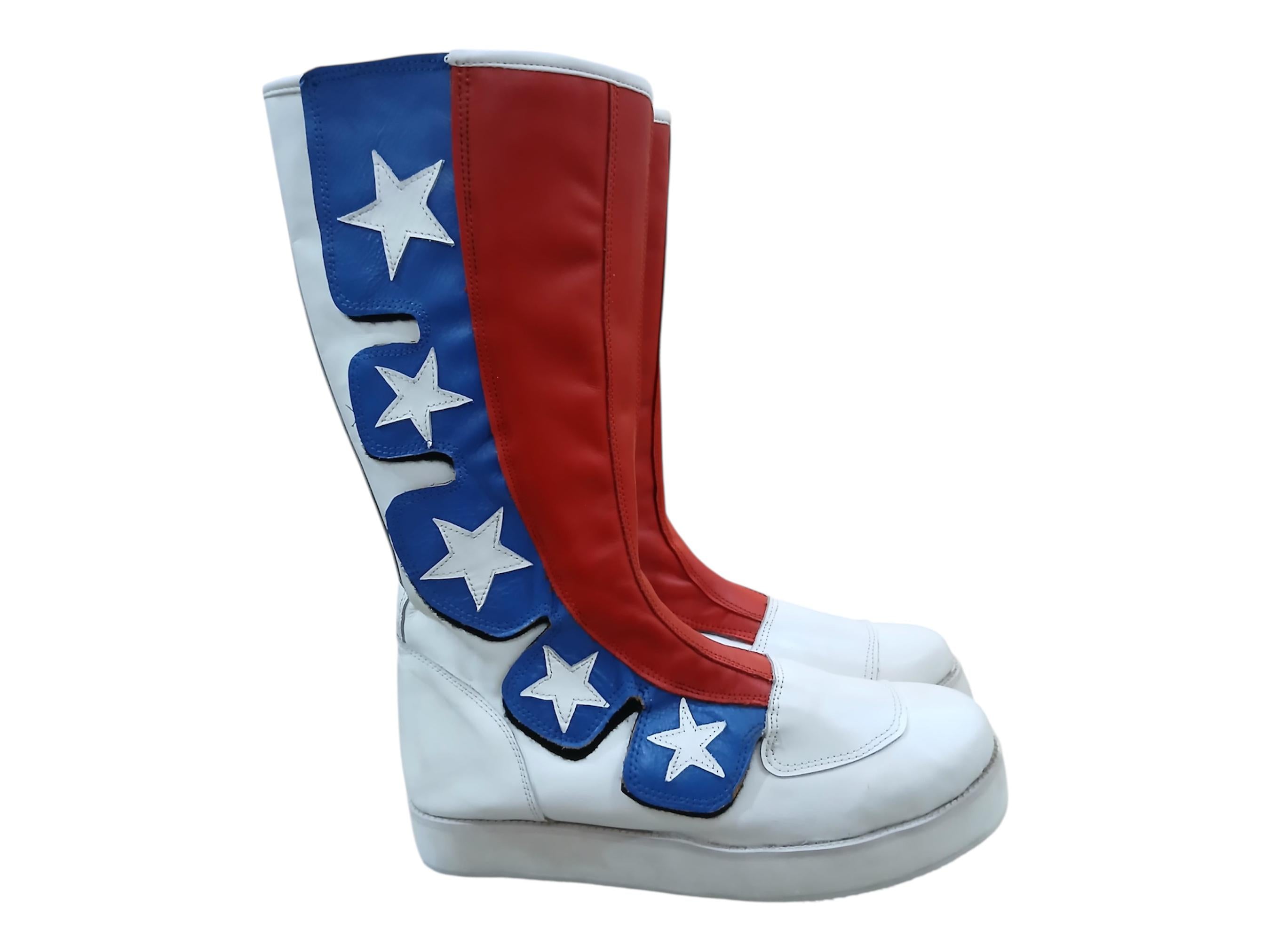 Full side view of American patriotic performance boots displaying clean slip-on design, round toe cap, and flat white rubber platform sole
