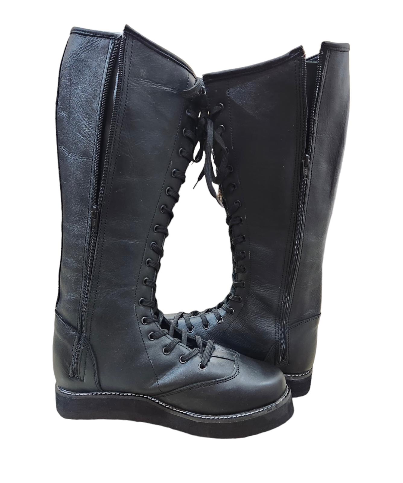 Professional black knee-high wrestling boots with lace-up front and side zipper