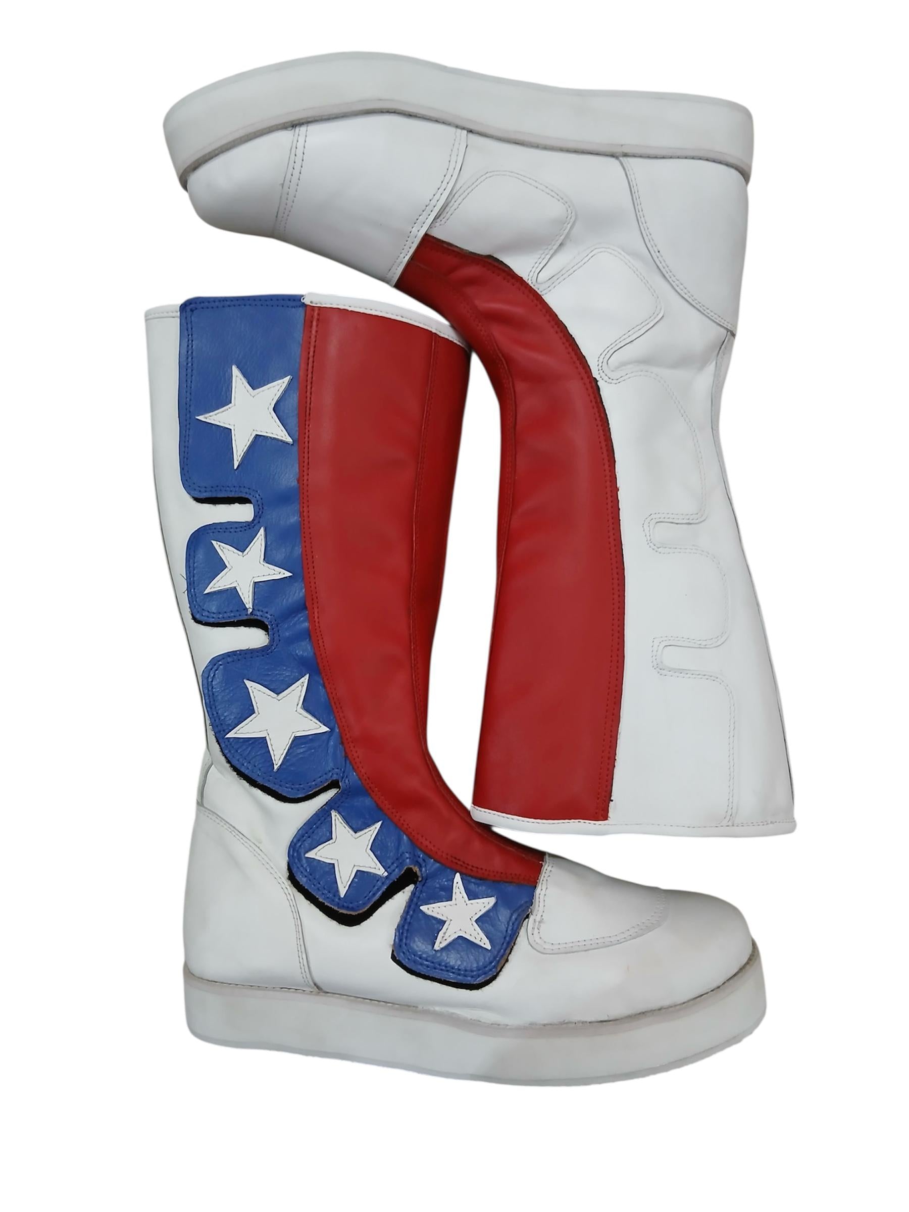 White boots with red, blue, and white star patterns on a white background