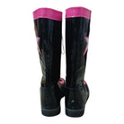 Unisex black patent wrestling boots with pink accents and decorative stars

