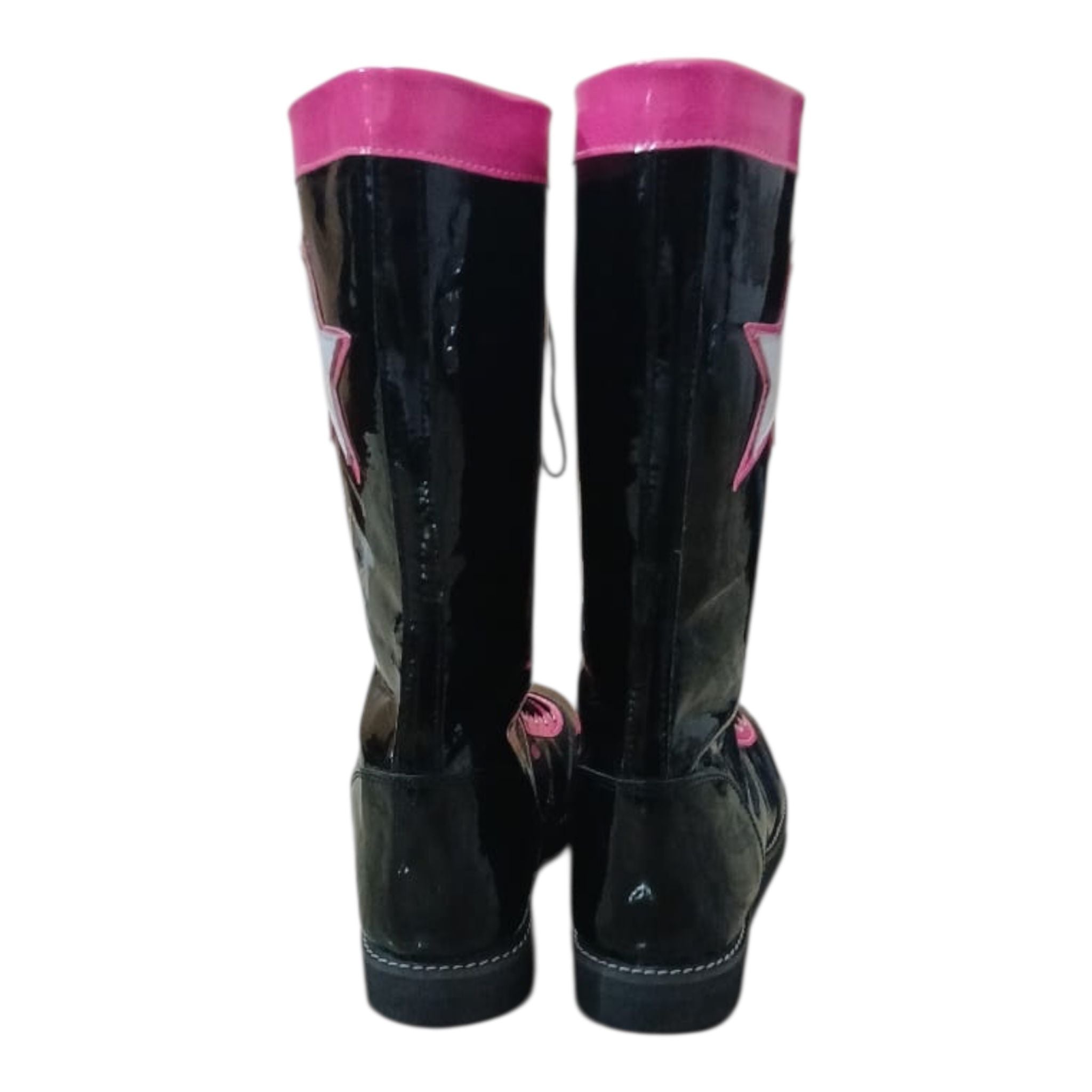 Unisex black patent wrestling boots with pink accents and decorative stars

