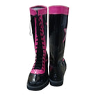 Black and pink rubber boots on a white background