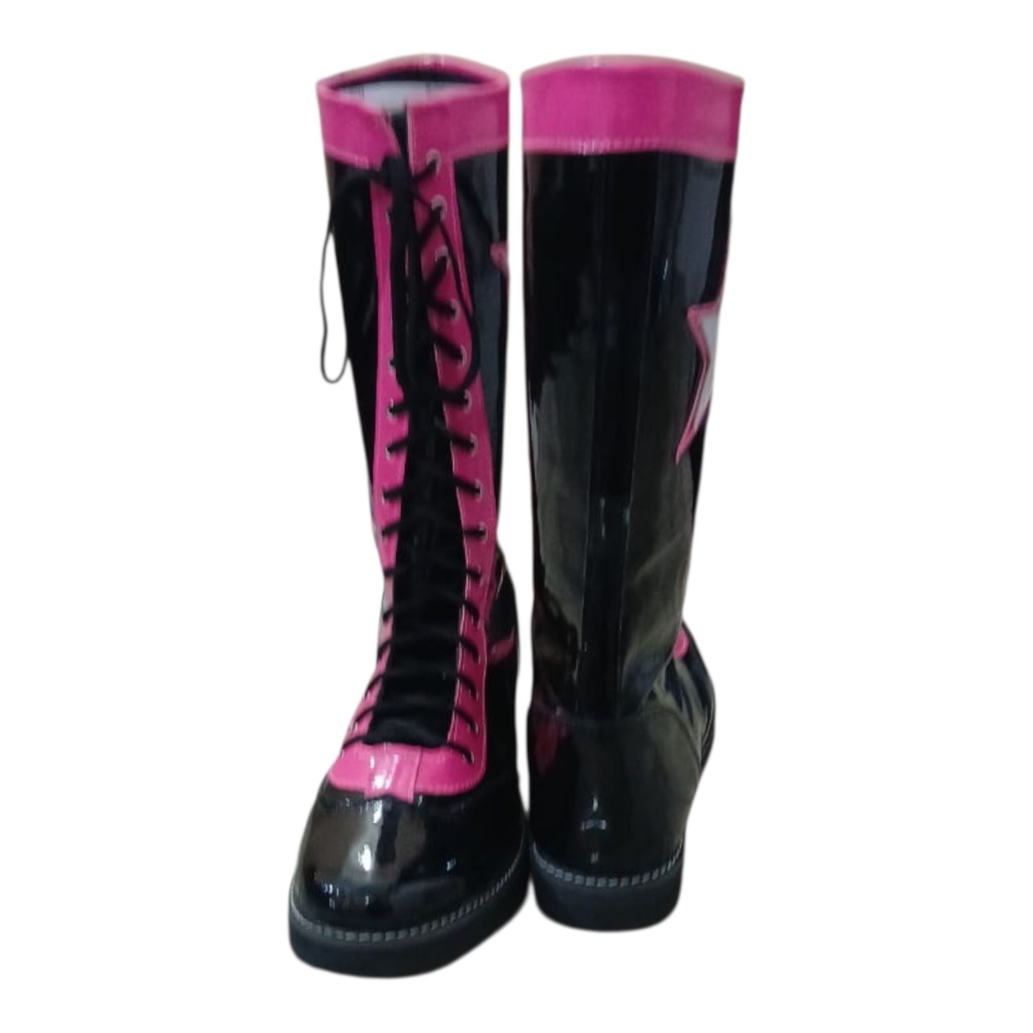 Black and pink rubber boots on a white background