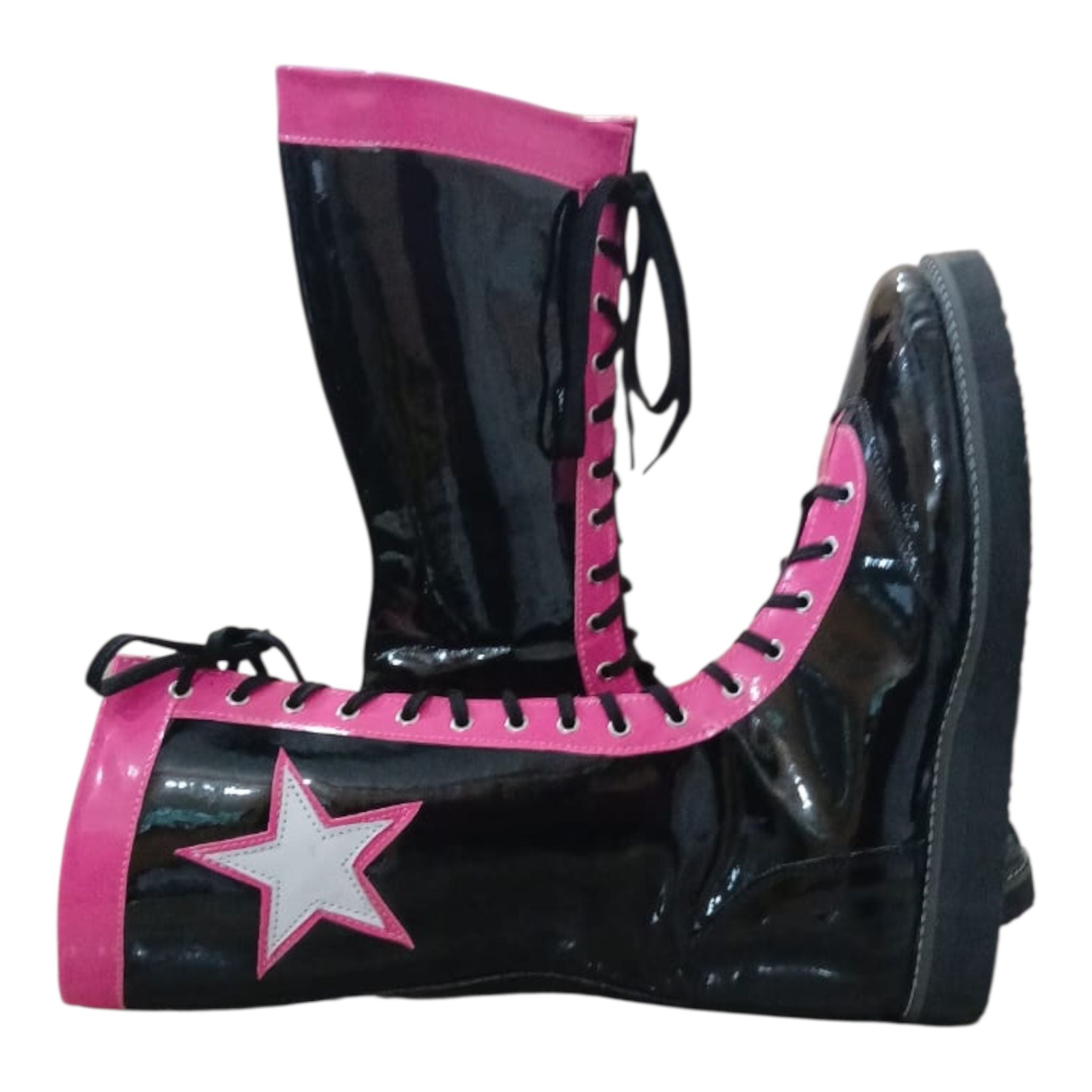 Black and pink boots with a star design on a white background