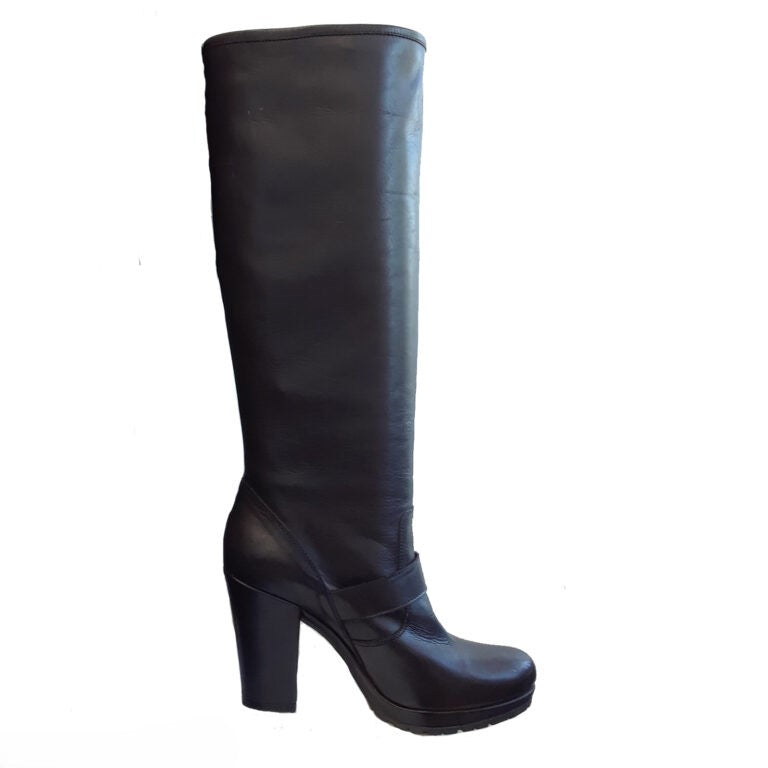 Black knee-high boot on a white background