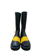 Professional black and yellow wrestling boots designed for training and ring use

