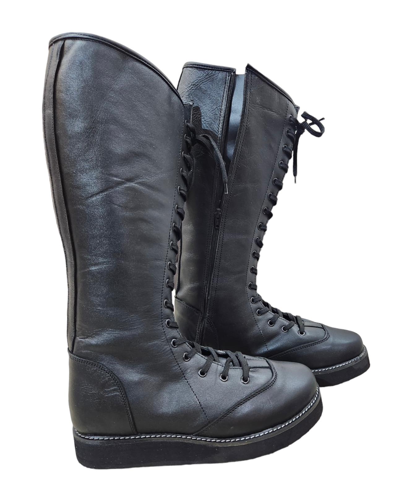 Side view of tall black wrestling footwear with zipper closure