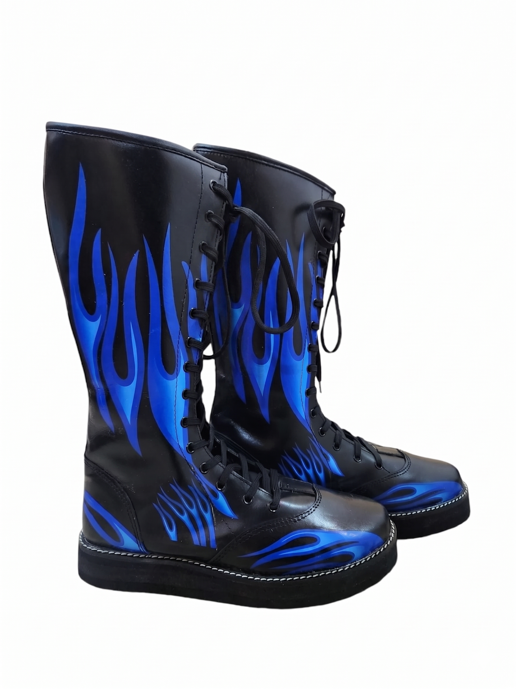 Black knee-high wrestling boots with all-over electric blue flame graphic print rising from toe to collar on white background