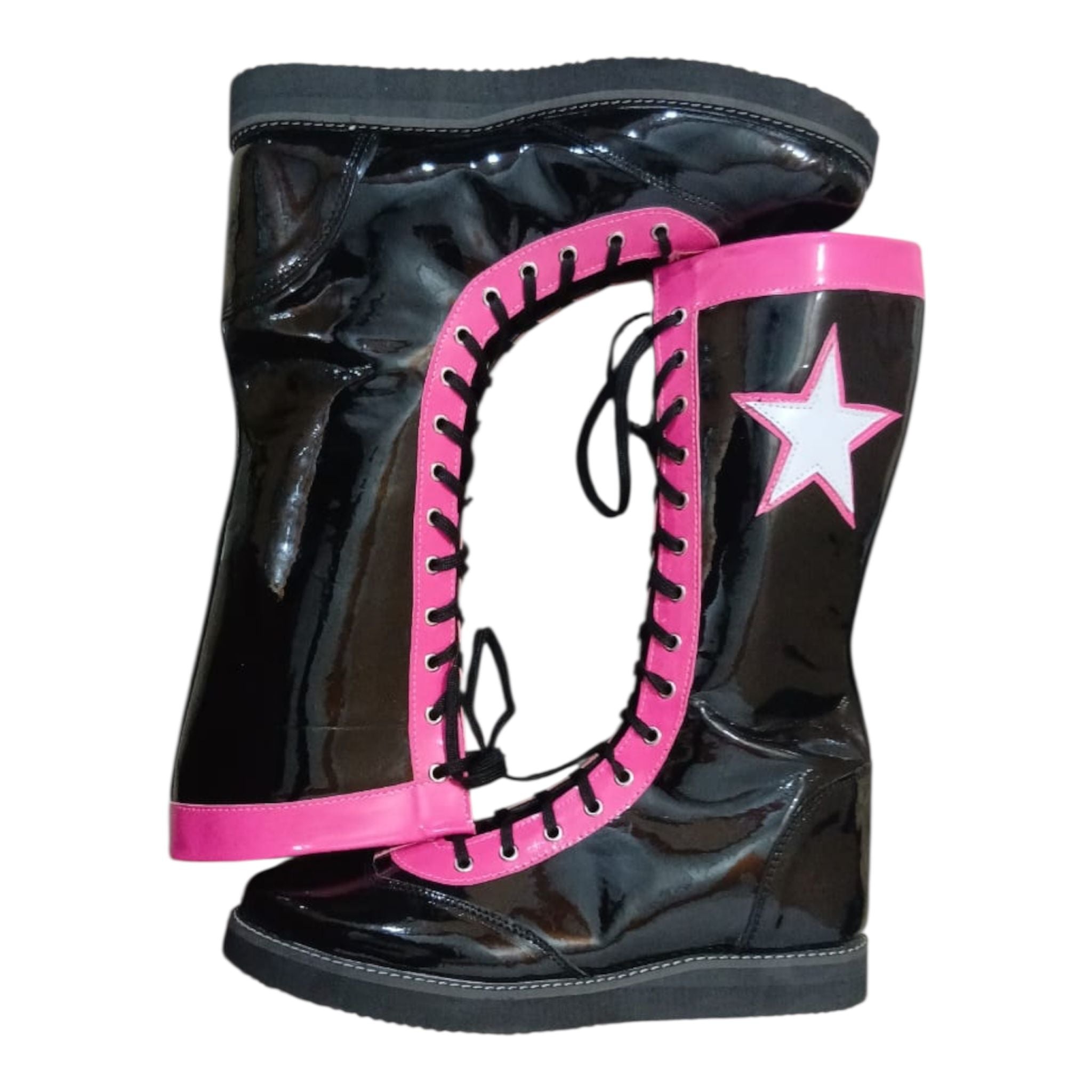 Black and pink boots with a star design on a white background