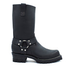 Side profile of black harness engineer boots displaying wide mouth tall shaft, rear pull strap with contrast brown topstitching, and cross-stitch leather badge patch