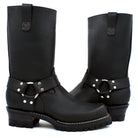 Black oiled leather tall shaft harness engineer boots with chrome D-ring and polished nickel stud double strap ankle harness system on white background