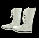 White professional lace-up wrestling boots with knee-high athletic design
